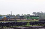 CSX 618 & HLCX 8137 in the ready field in a light rain